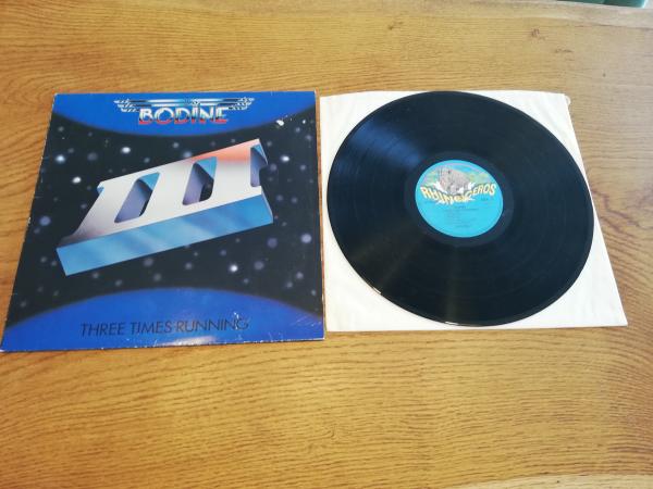 Bodine – Three Times Running 1983 Rhinoceros – 24.0256-1 Belgische Pressung VG+/VG